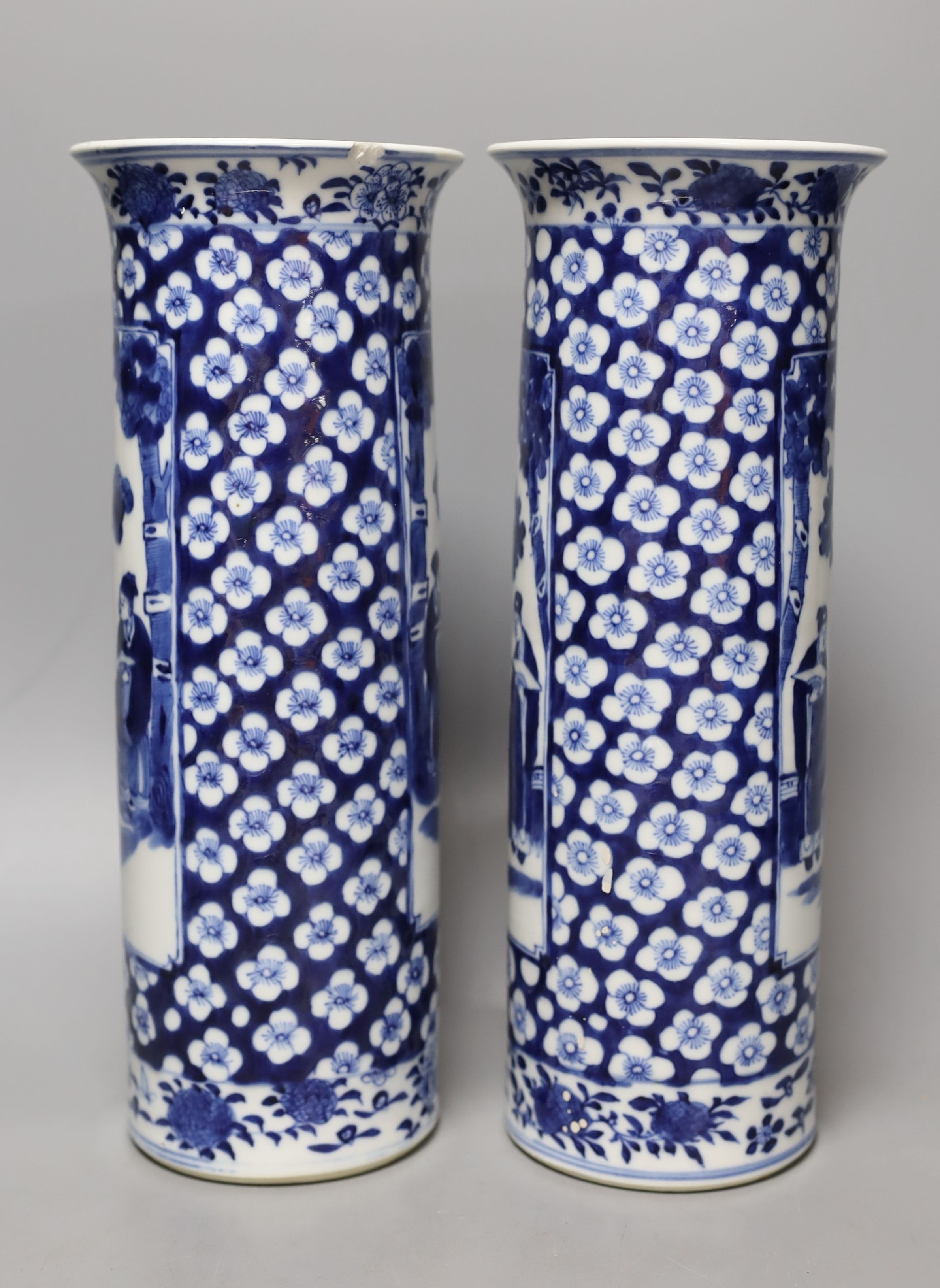 A pair of Chinese blue and white sleeve vases, late 19th century, 31cm